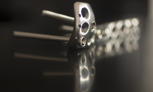 Orthopedic implant with smooth surface texture